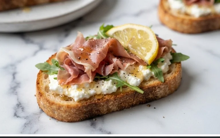 Beef Prosciutto Crostini with Burrata and Lemon Honey Drizzle
